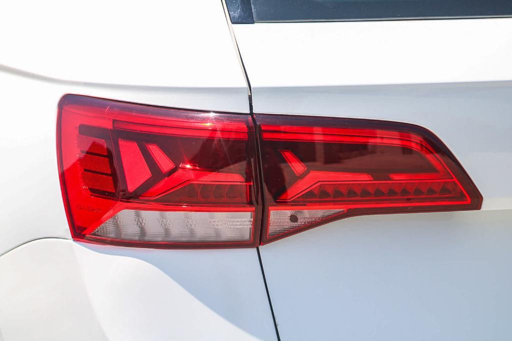 used 2023 Volkswagen Taos car, priced at $18,561