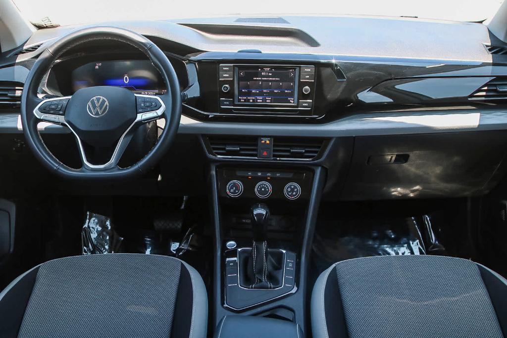 used 2023 Volkswagen Taos car, priced at $18,561