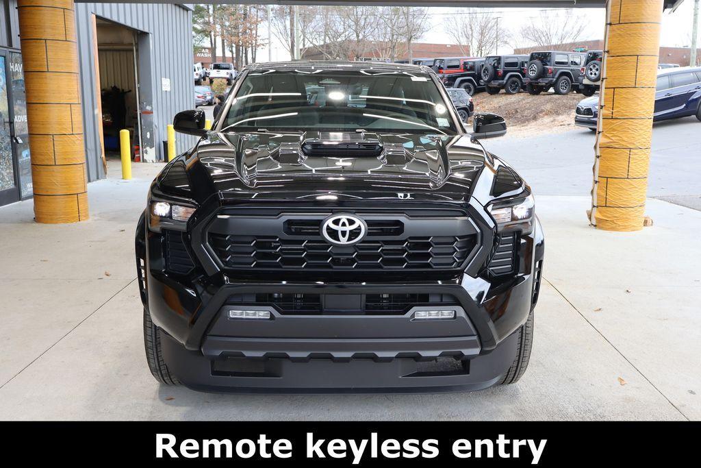 used 2024 Toyota Tacoma car, priced at $40,872