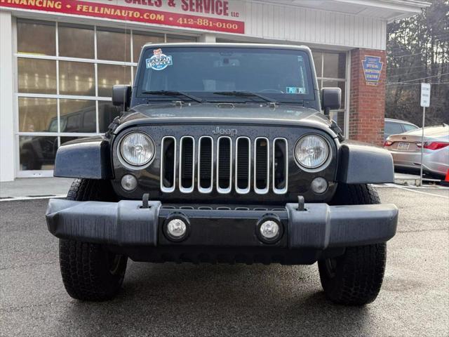 used 2016 Jeep Wrangler Unlimited car, priced at $16,995