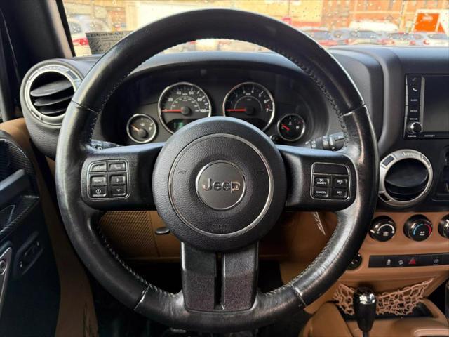 used 2016 Jeep Wrangler Unlimited car, priced at $16,995