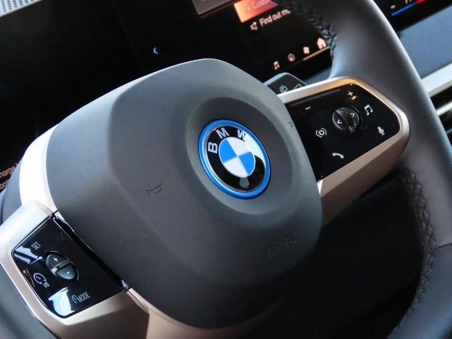 new 2024 BMW iX car, priced at $99,305