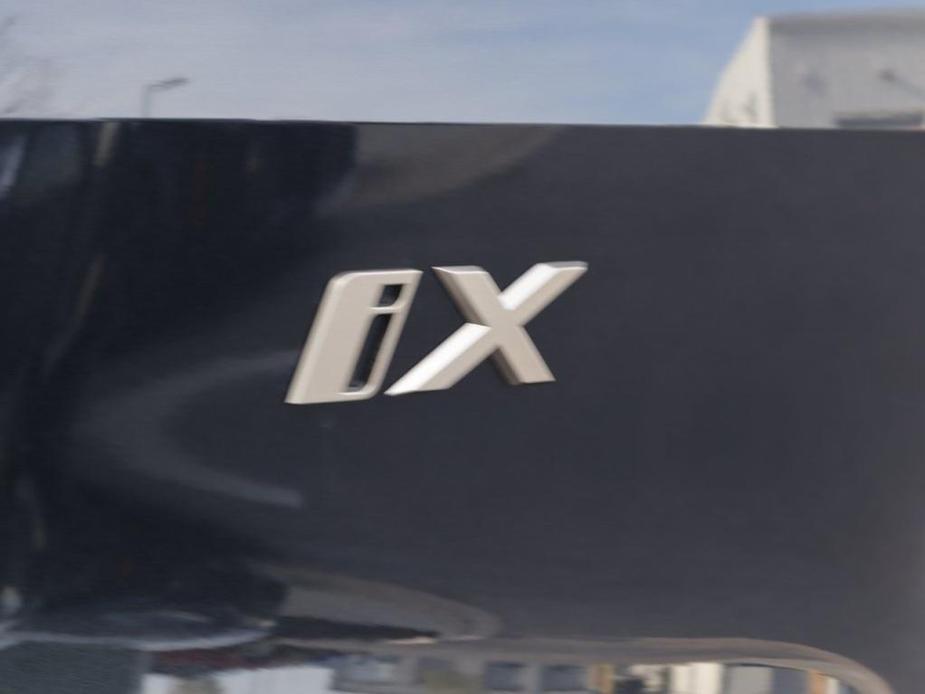 new 2024 BMW iX car, priced at $97,855