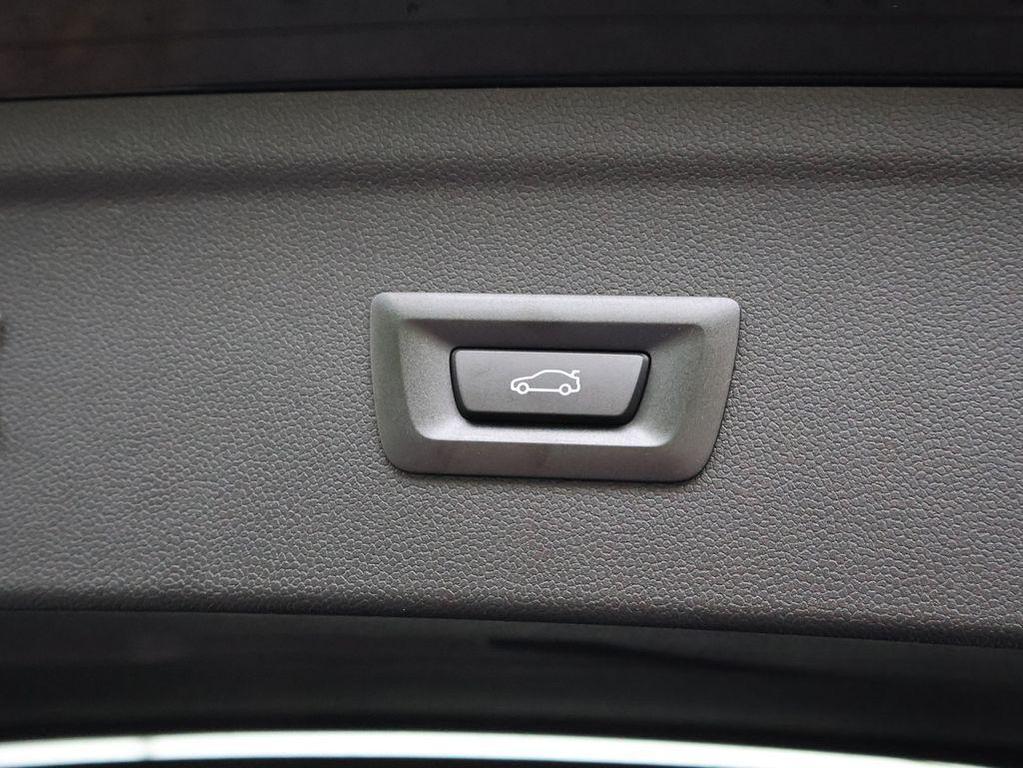 new 2026 BMW iX car, priced at $84,945