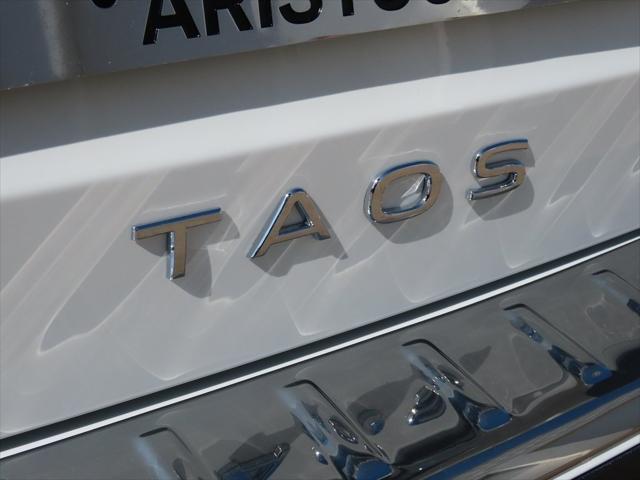 new 2024 Volkswagen Taos car, priced at $27,613