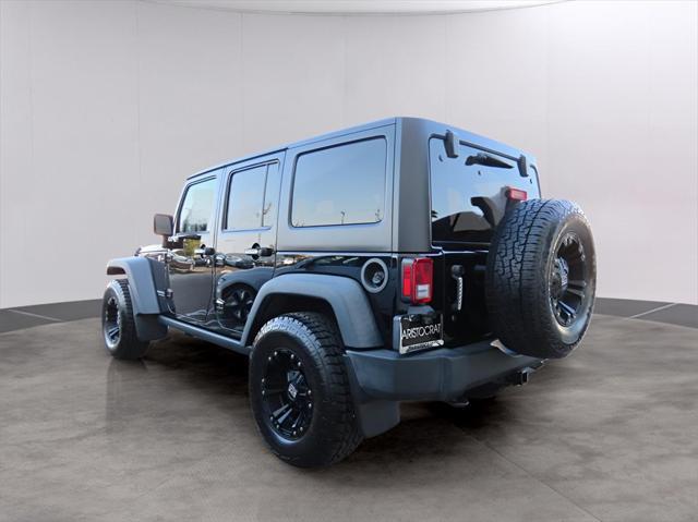 used 2016 Jeep Wrangler Unlimited car, priced at $22,923