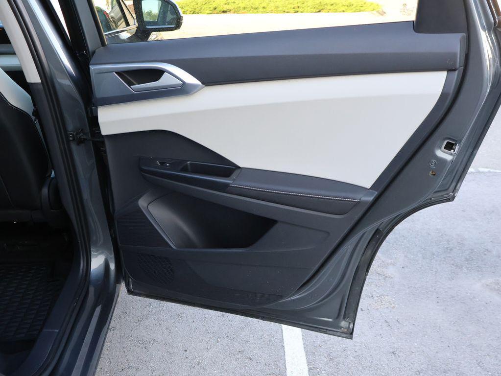 used 2025 Volkswagen Taos car, priced at $25,905