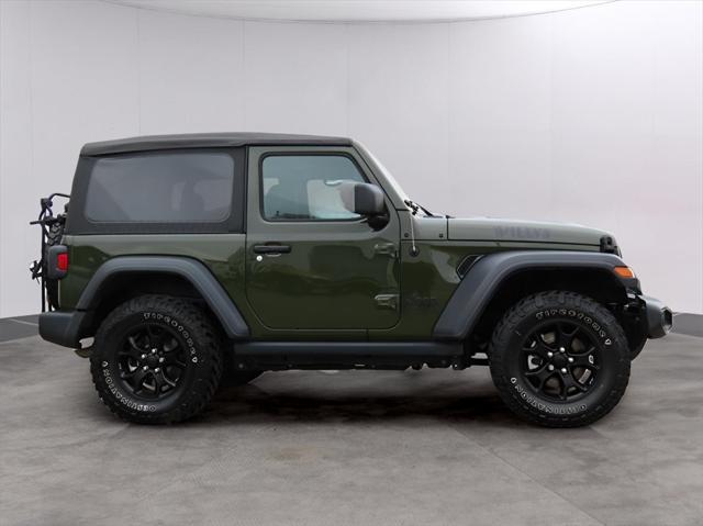 used 2023 Jeep Wrangler car, priced at $33,883