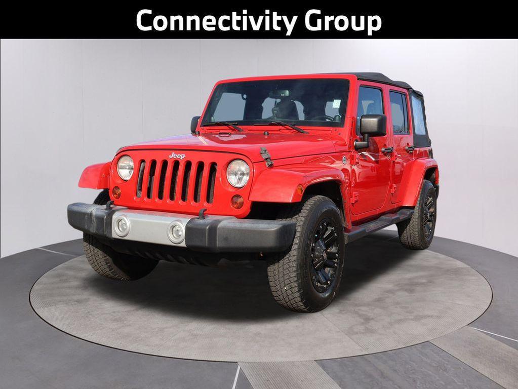 used 2013 Jeep Wrangler Unlimited car, priced at $16,495