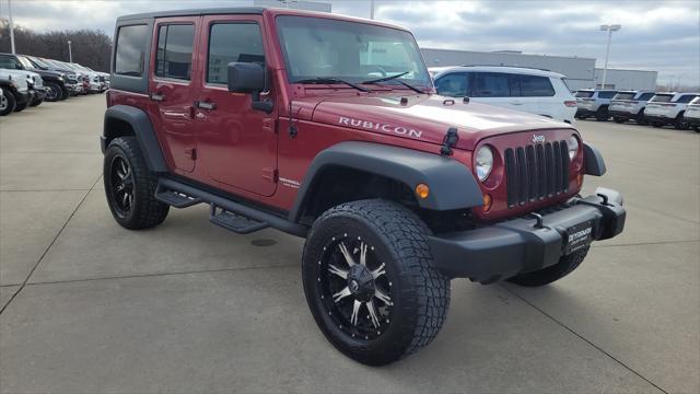 used 2011 Jeep Wrangler Unlimited car, priced at $16,990