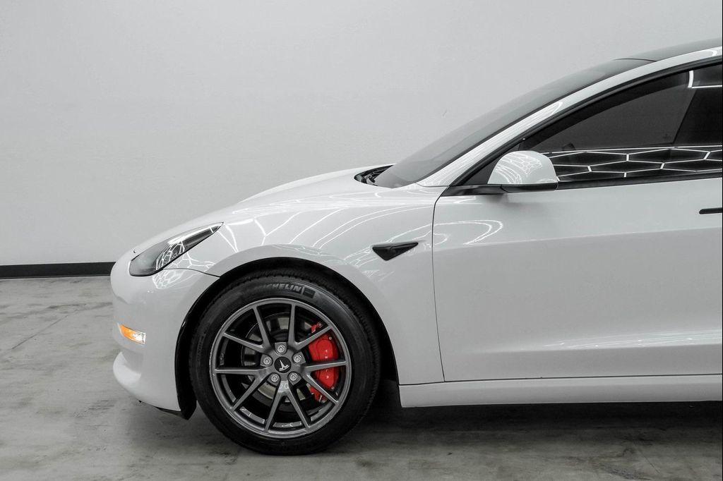 used 2022 Tesla Model 3 car, priced at $28,499