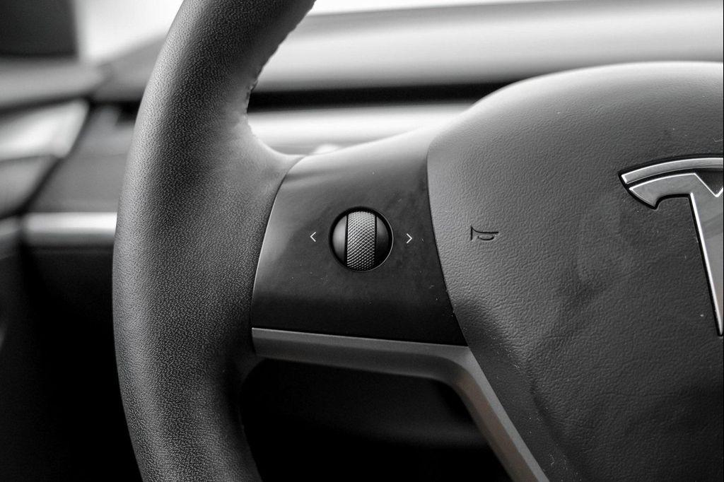 used 2022 Tesla Model 3 car, priced at $27,999