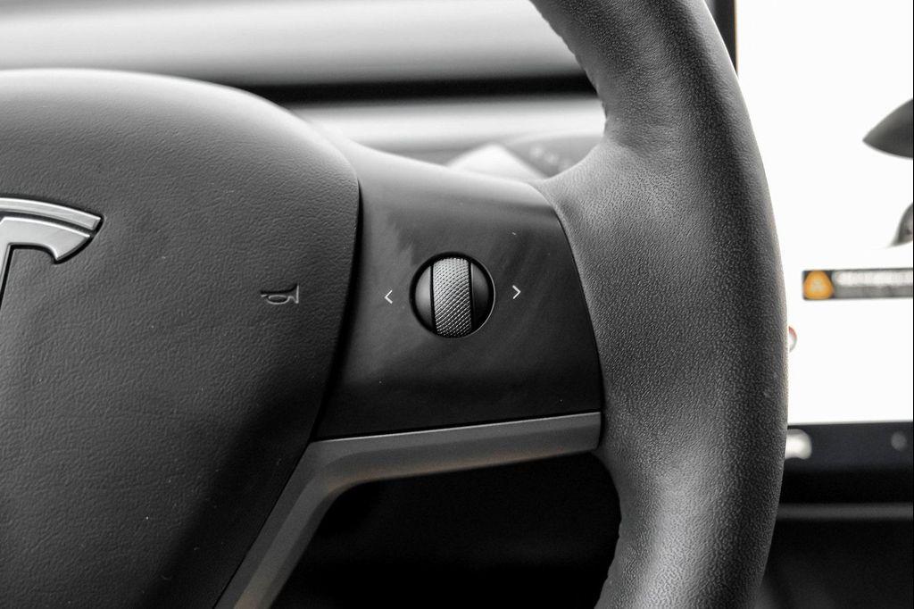 used 2022 Tesla Model 3 car, priced at $27,999