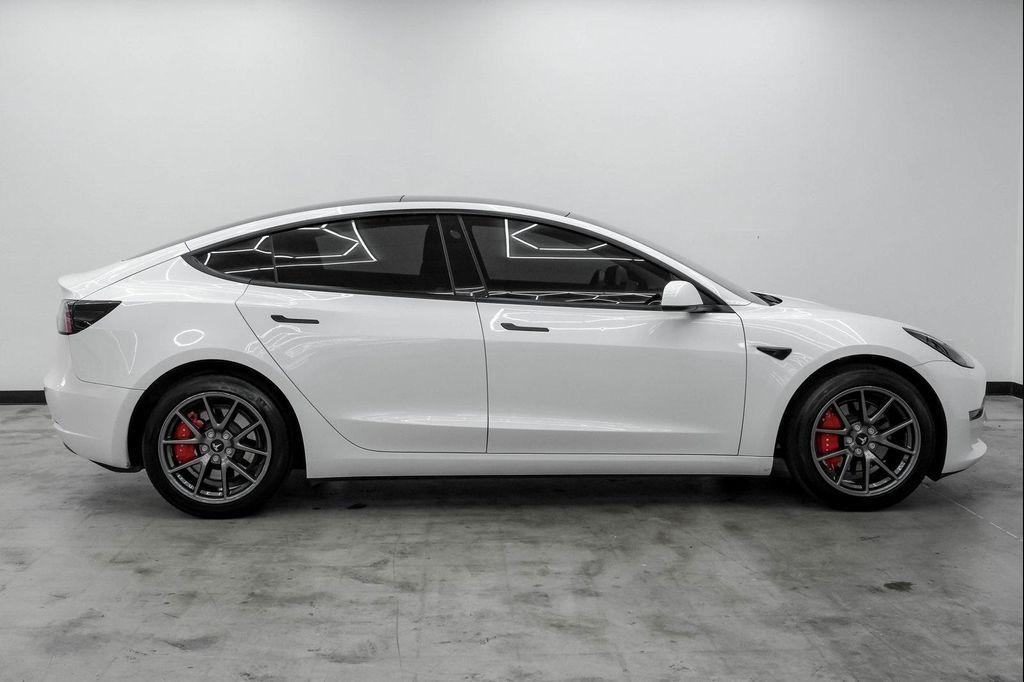 used 2022 Tesla Model 3 car, priced at $28,499