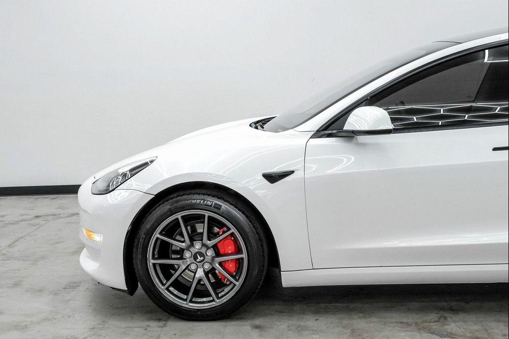 used 2022 Tesla Model 3 car, priced at $27,999