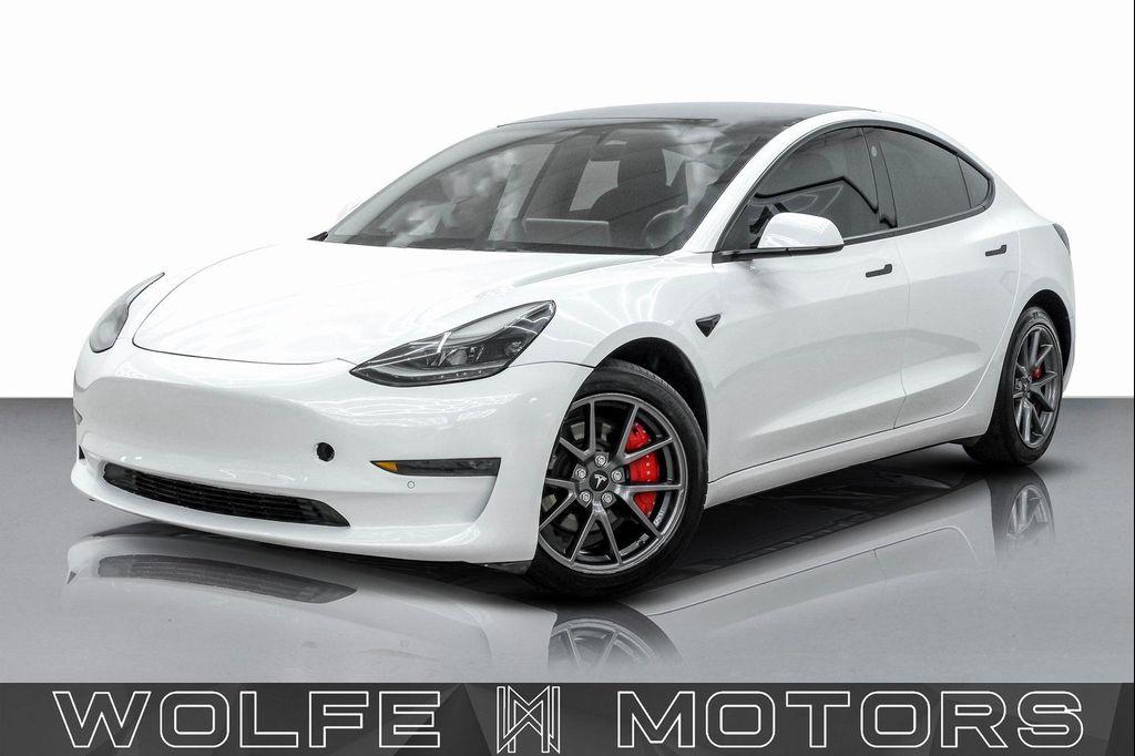 used 2022 Tesla Model 3 car, priced at $27,999