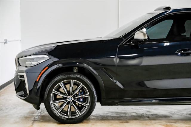 used 2022 BMW X6 car, priced at $56,999