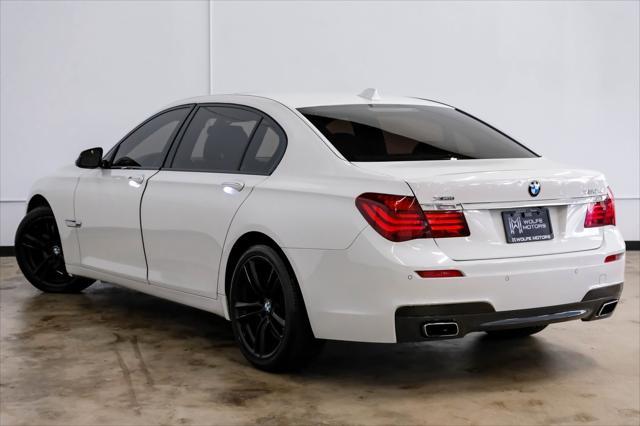 used 2014 BMW 750 car, priced at $10,999