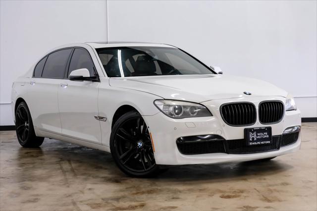 used 2014 BMW 750 car, priced at $10,999