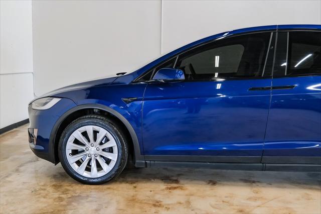 used 2018 Tesla Model X car, priced at $27,988