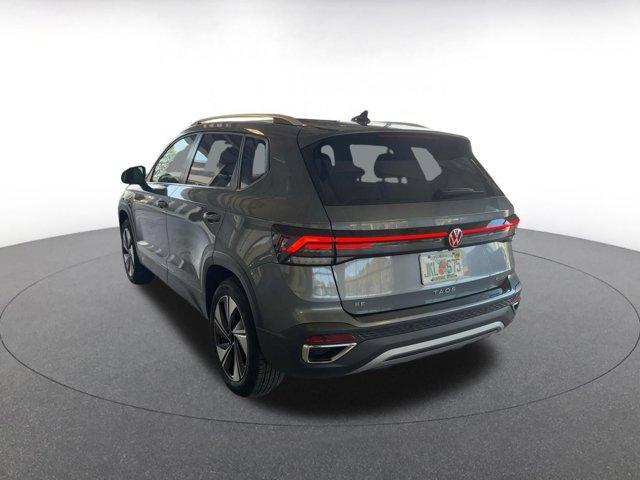 used 2025 Volkswagen Taos car, priced at $25,010