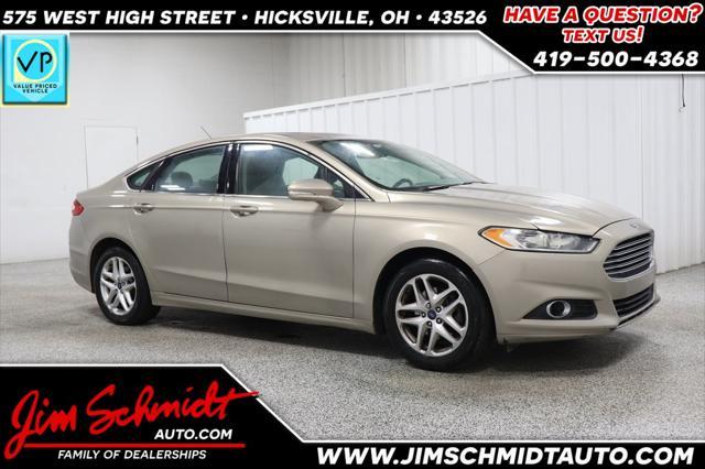 used 2015 Ford Fusion car, priced at $7,695