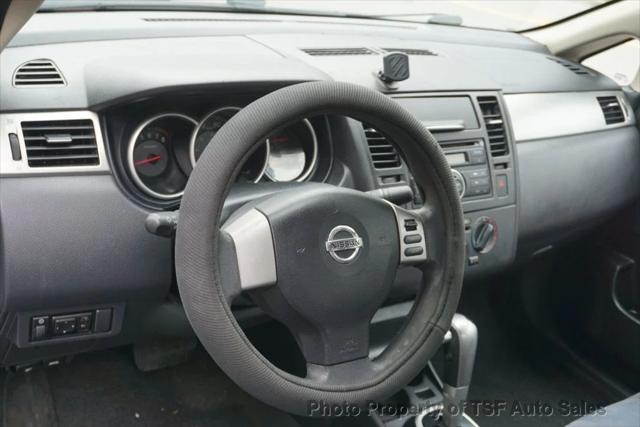 used 2009 Nissan Versa car, priced at $5,985