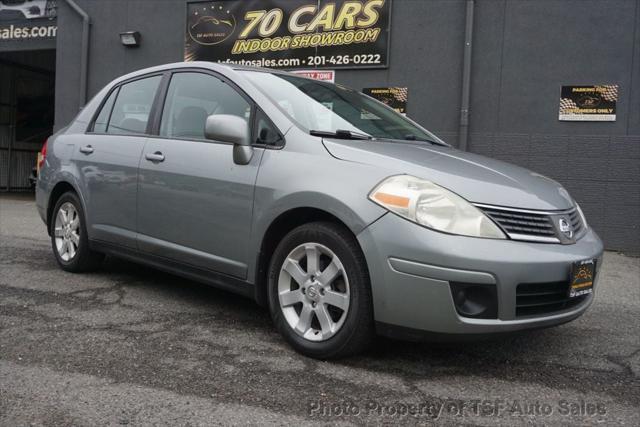 used 2009 Nissan Versa car, priced at $5,985