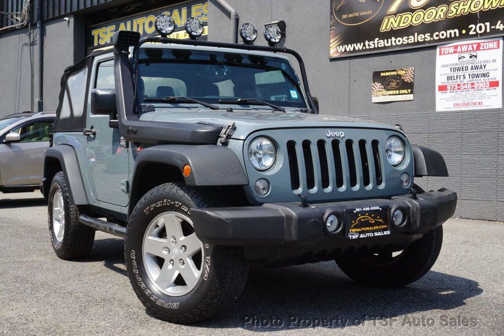 used 2015 Jeep Wrangler car, priced at $13,675