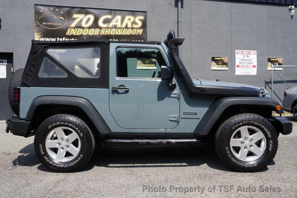 used 2015 Jeep Wrangler car, priced at $13,675