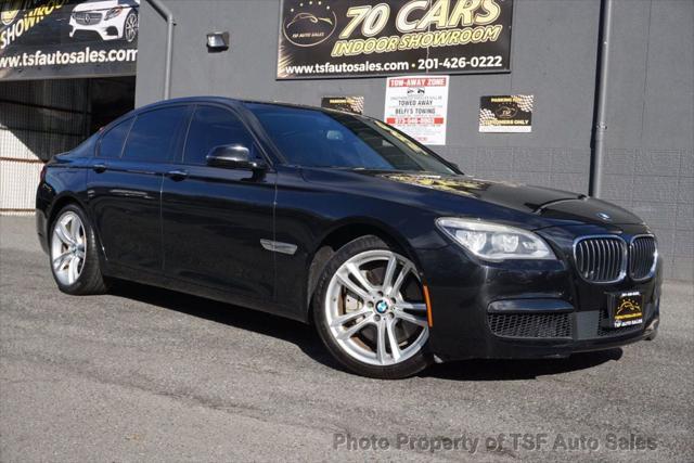 used 2014 BMW 750 car, priced at $14,985