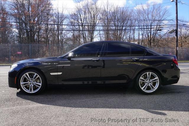 used 2014 BMW 750 car, priced at $13,985