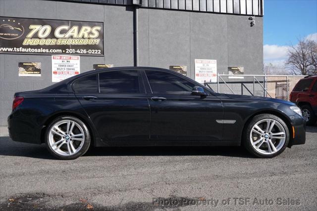 used 2014 BMW 750 car, priced at $13,985