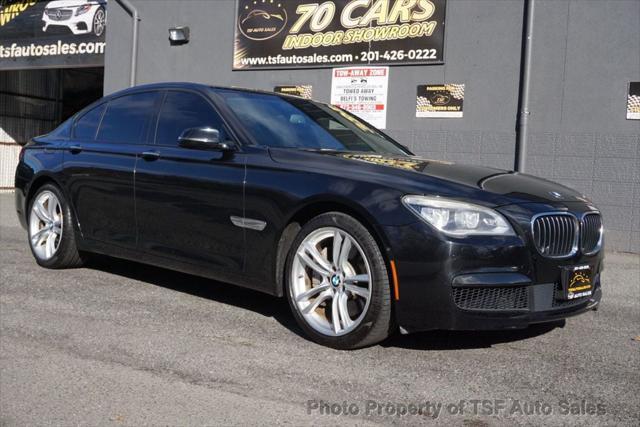 used 2014 BMW 750 car, priced at $13,985