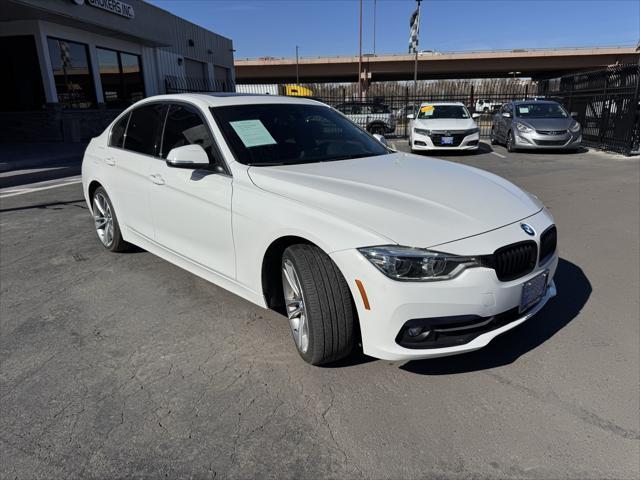 used 2018 BMW 330 car, priced at $19,300