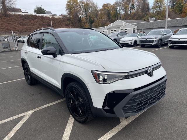 used 2025 Volkswagen Taos car, priced at $28,694