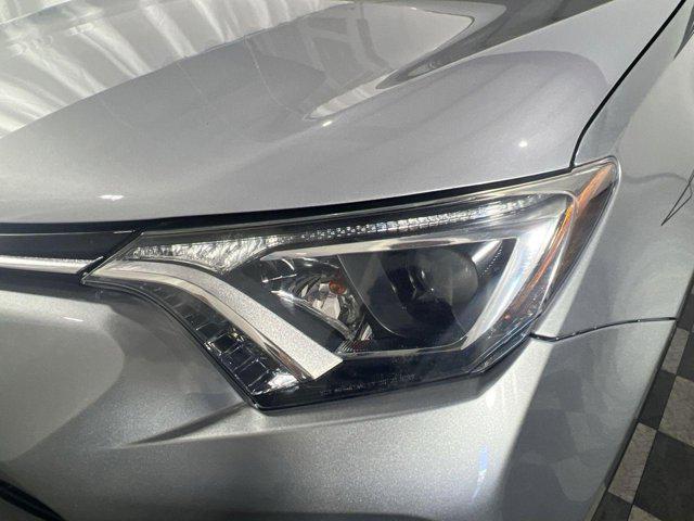 used 2018 Toyota RAV4 car, priced at $20,000