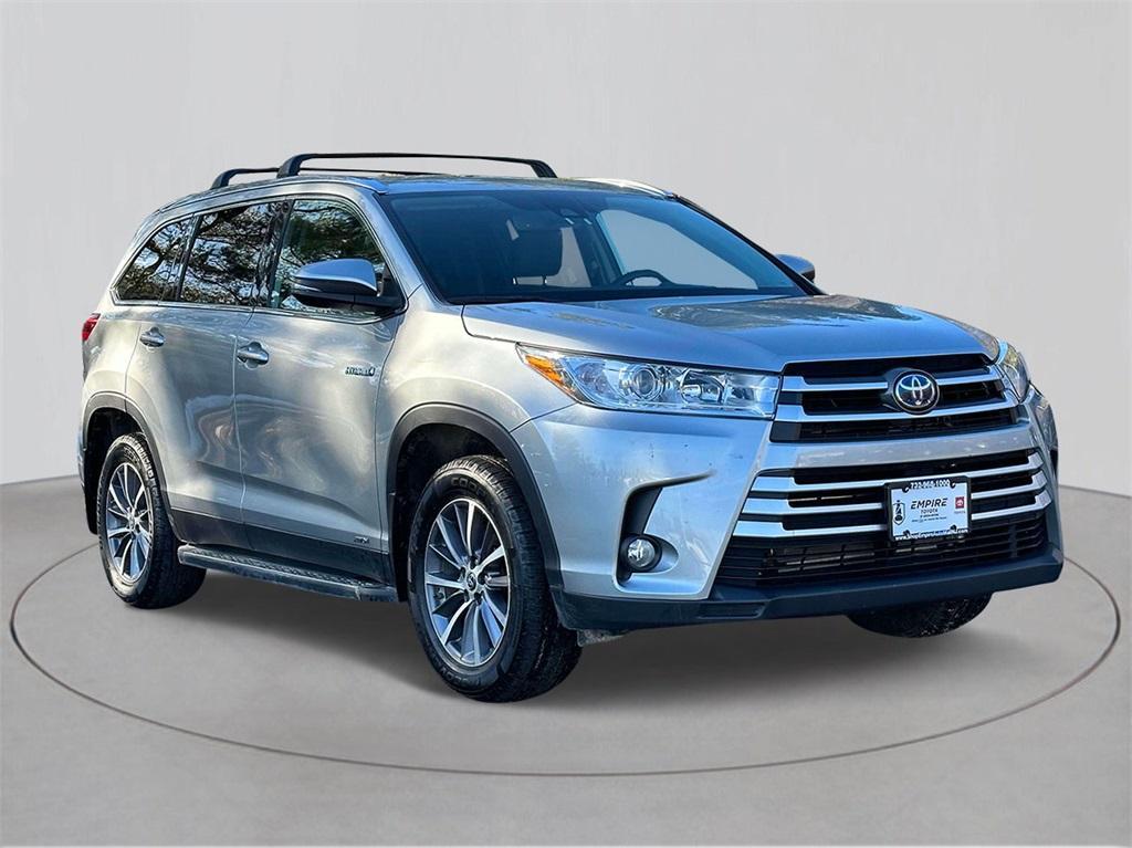 used 2019 Toyota Highlander Hybrid car, priced at $26,216