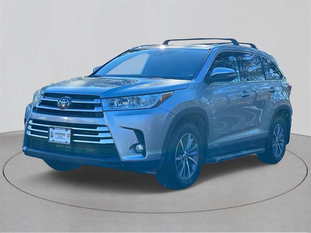 used 2019 Toyota Highlander Hybrid car, priced at $26,216