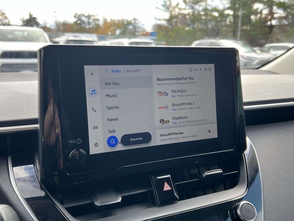 used 2023 Toyota Corolla car, priced at $14,291