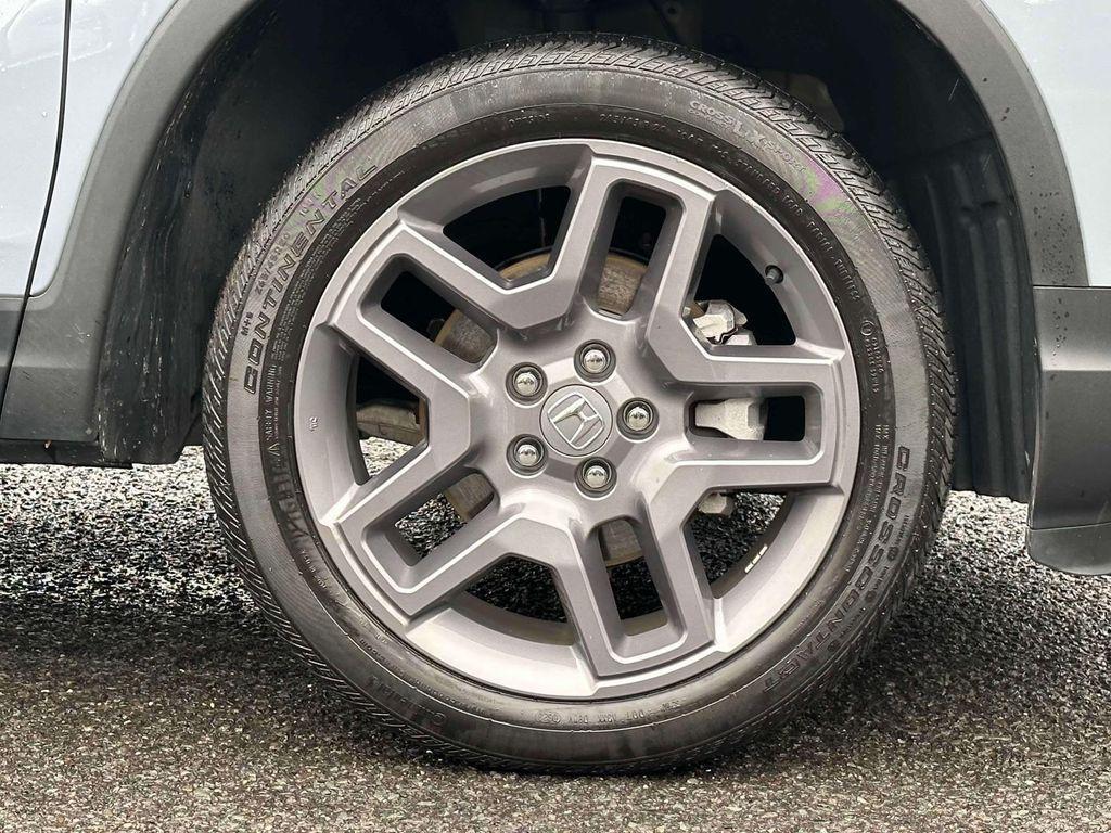 used 2023 Honda Passport car, priced at $32,250