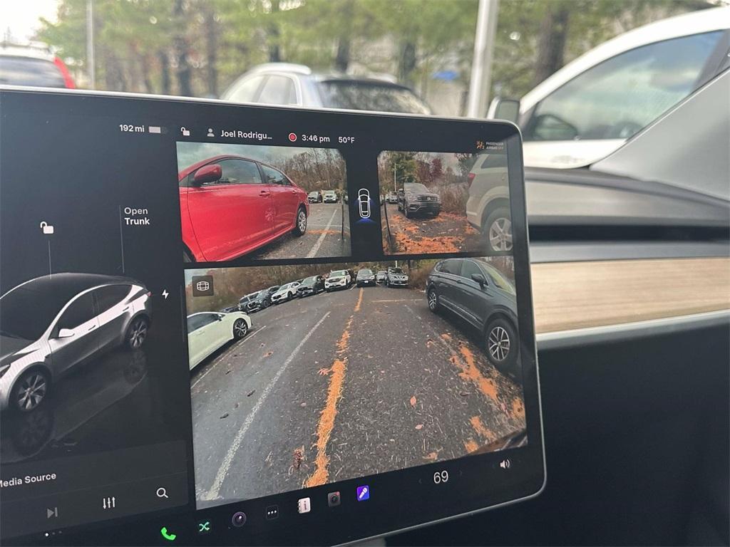 used 2024 Tesla Model Y car, priced at $33,997