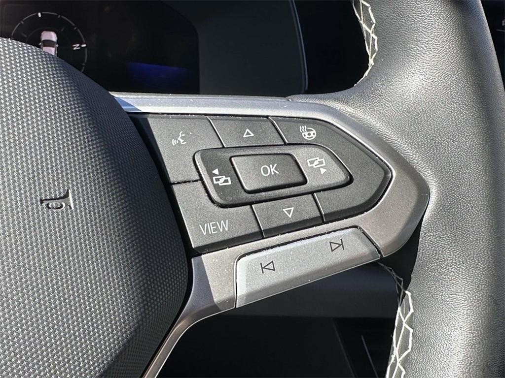 used 2023 Volkswagen Taos car, priced at $21,981