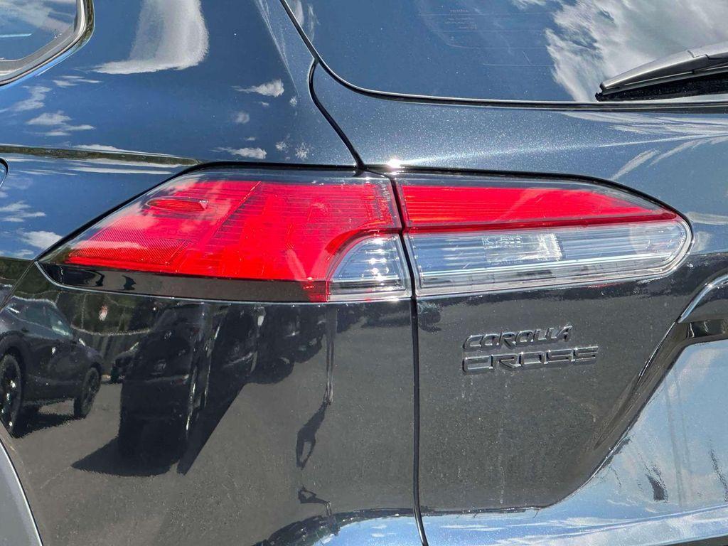 used 2023 Toyota Corolla Cross Hybrid car, priced at $29,234