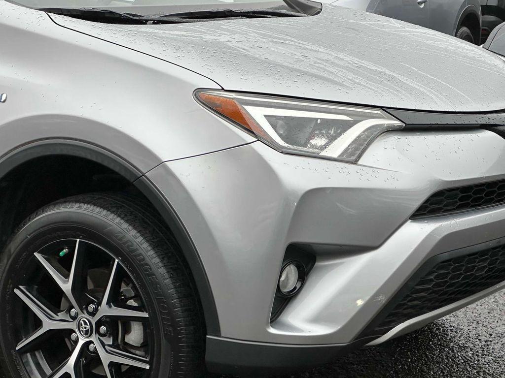 used 2018 Toyota RAV4 Hybrid car, priced at $27,995