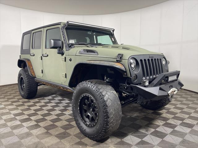 used 2013 Jeep Wrangler Unlimited car, priced at $16,999