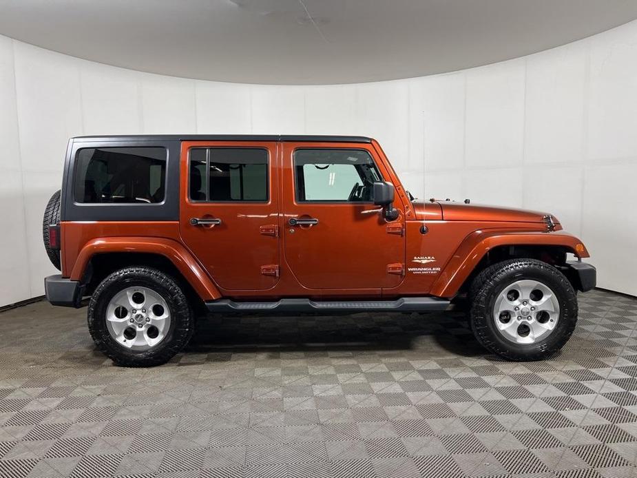 used 2014 Jeep Wrangler Unlimited car, priced at $14,488