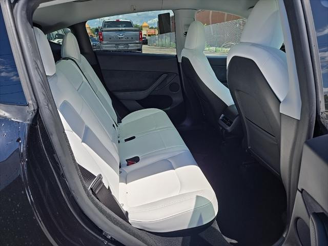 used 2024 Tesla Model Y car, priced at $39,707