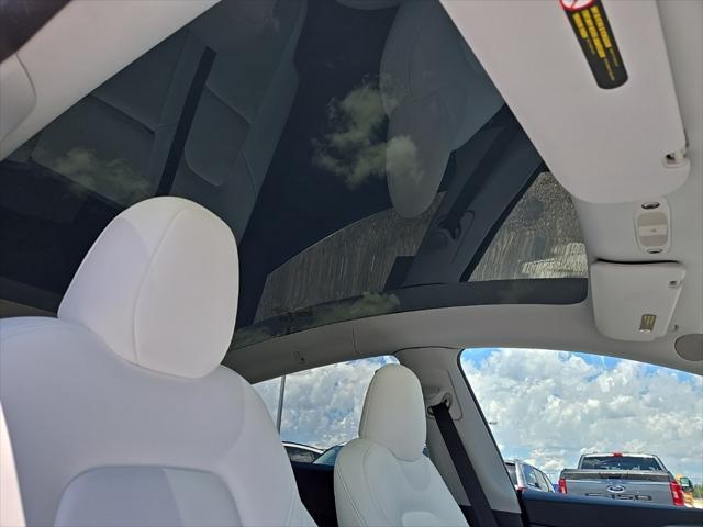 used 2024 Tesla Model Y car, priced at $39,707