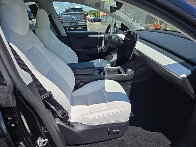 used 2024 Tesla Model Y car, priced at $39,707